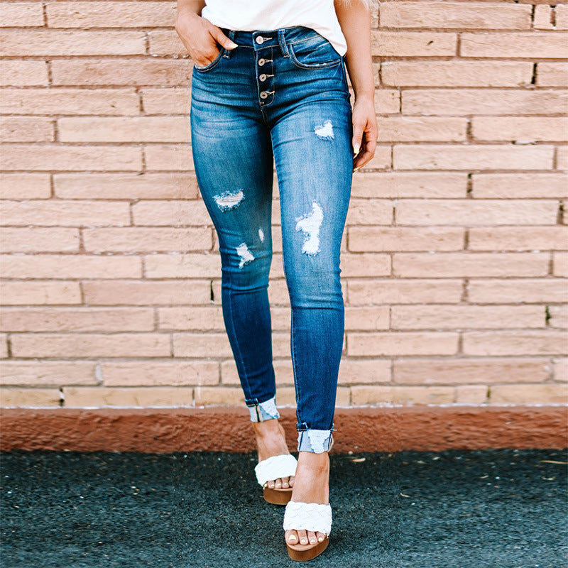 Mid-rise Button-fly Distressed Skinny Jeans