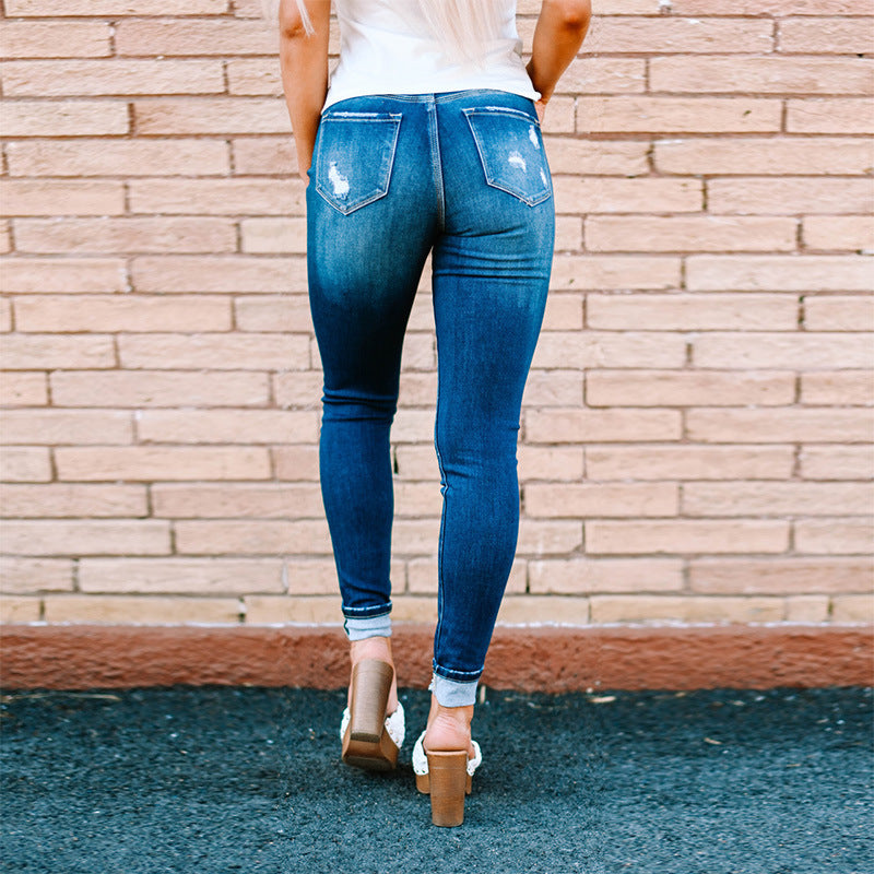 Mid-rise Button-fly Distressed Skinny Jeans