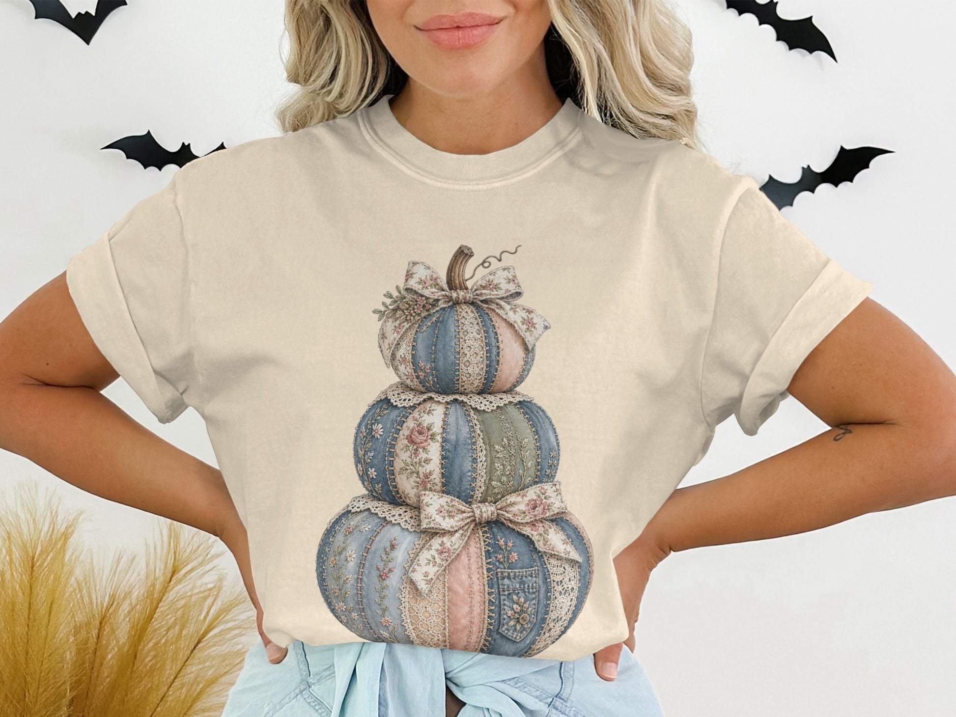 Cream t-shirt with three stacked patchwork pumpkins design.