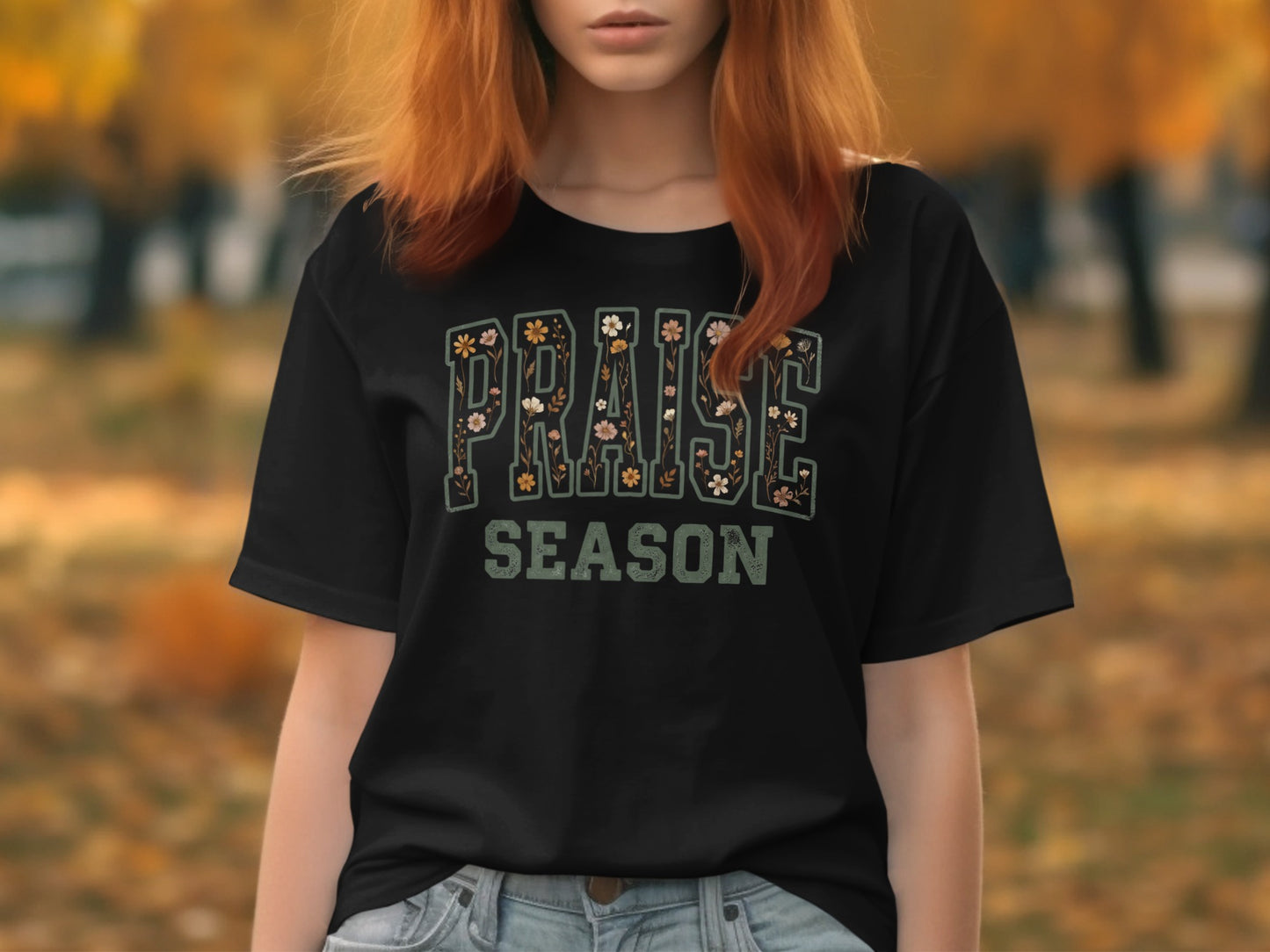 Black t-shirt with "PRAISE SEASON" text adorned with floral details.