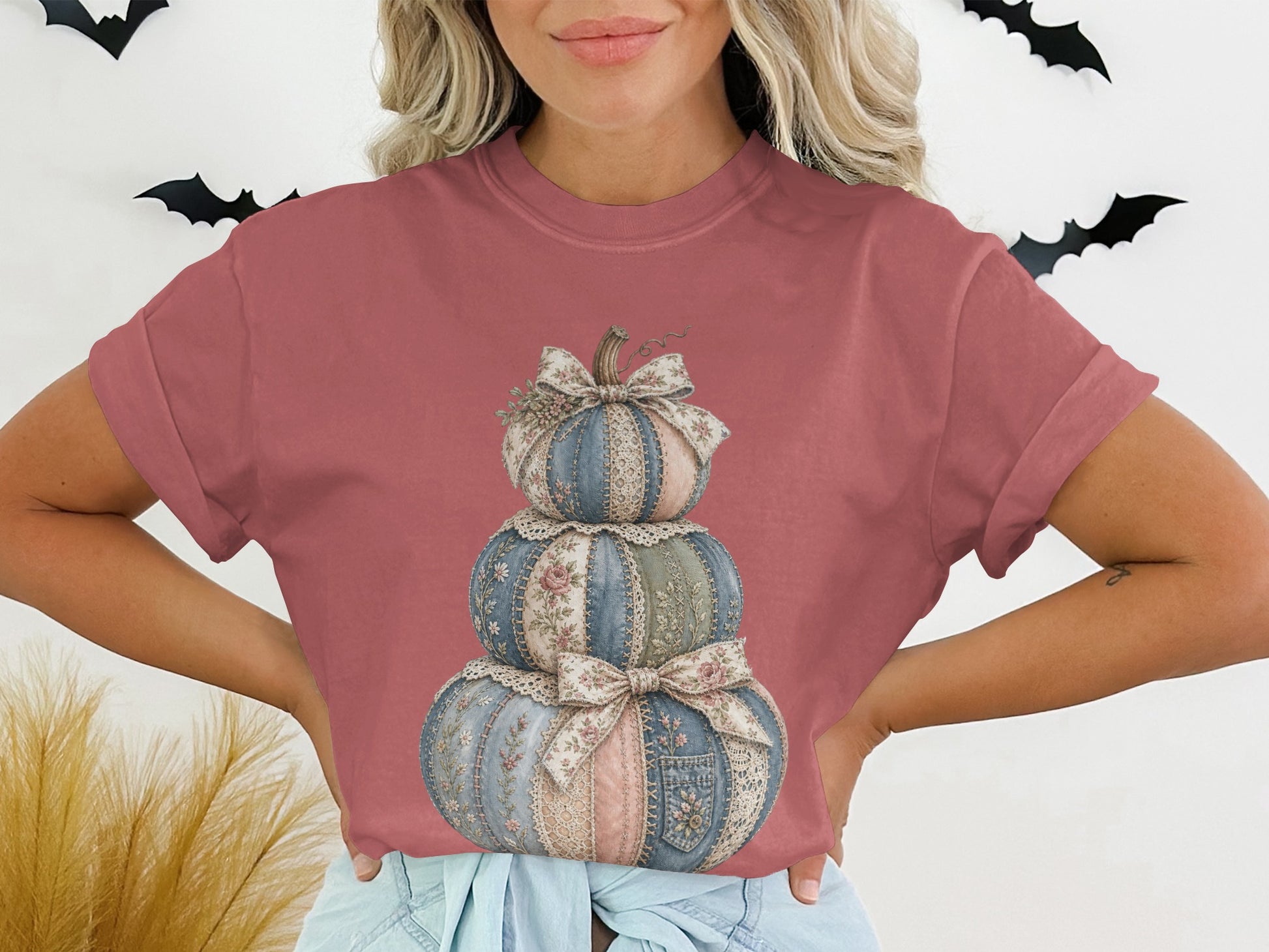 T-shirt with a stacked pumpkin graphic made of patterned fabric scraps and lace.