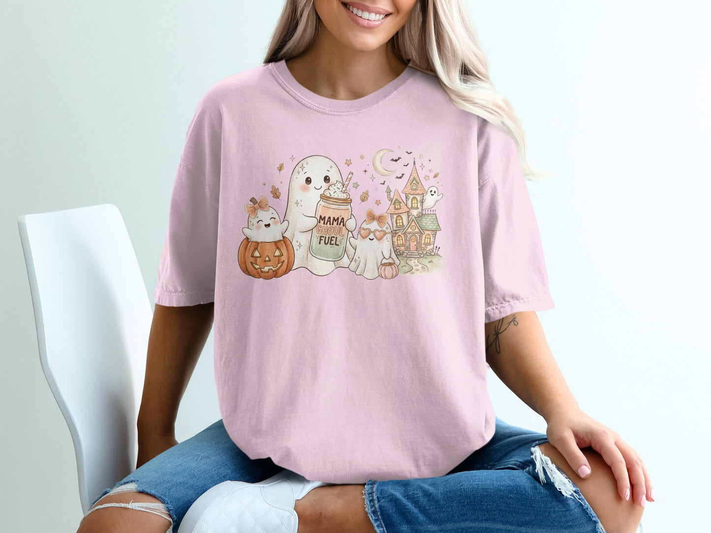 Cute Halloween cartoon with ghosts, pumpkins, and haunted house. "Mama Ghoul Fuel" text.