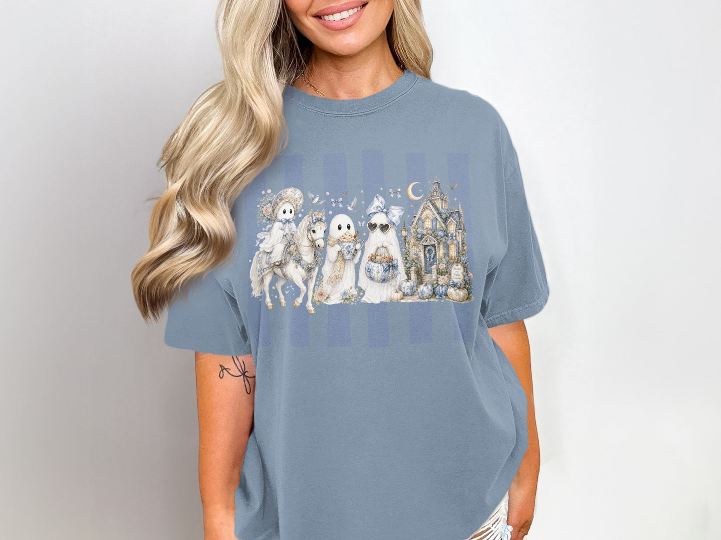Ghost characters with a horse, haunted house, and pumpkins on a blue striped background.