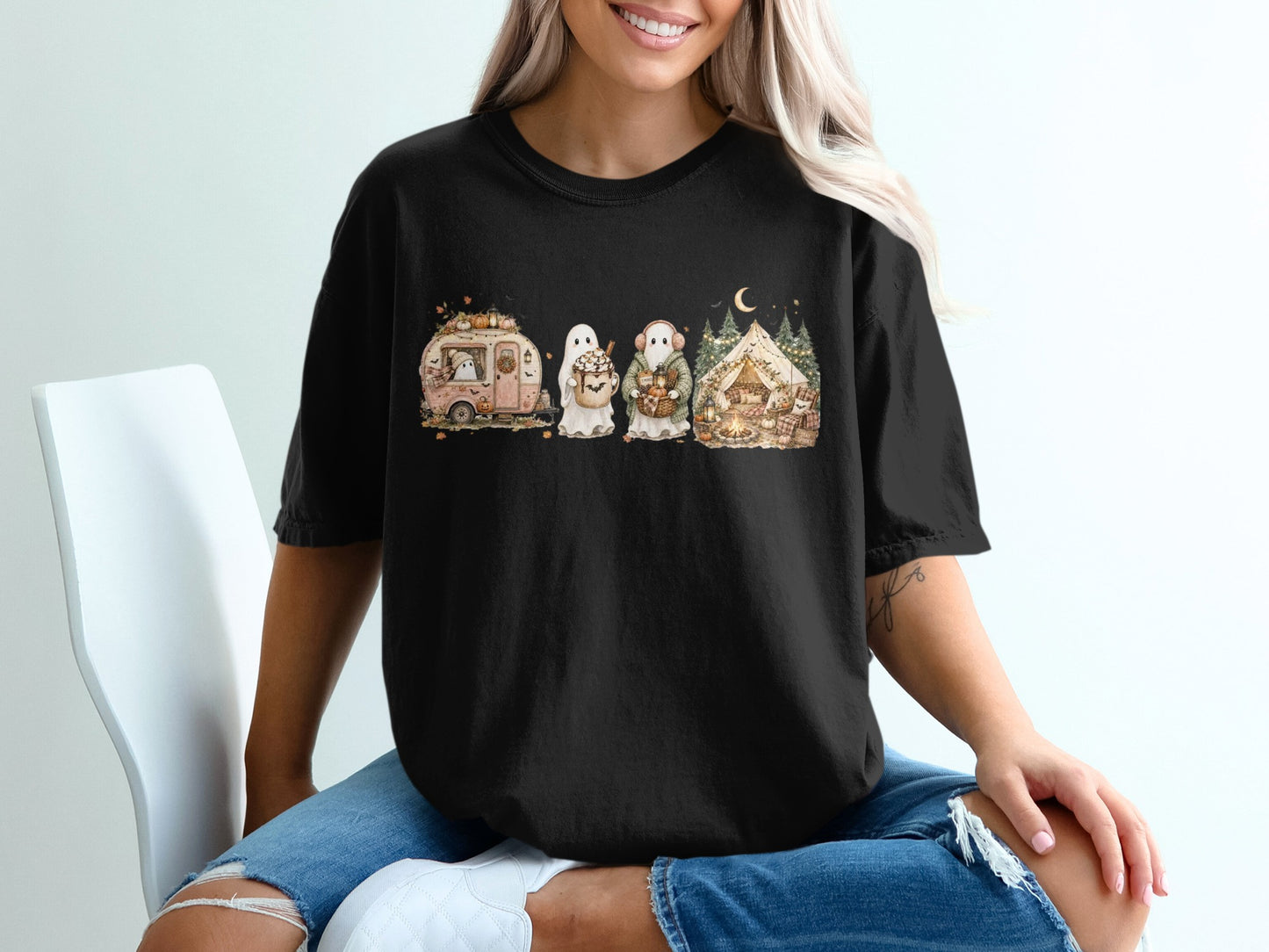 Black t-shirt with cartoon ghosts, a camper, tent, and moon graphic.
