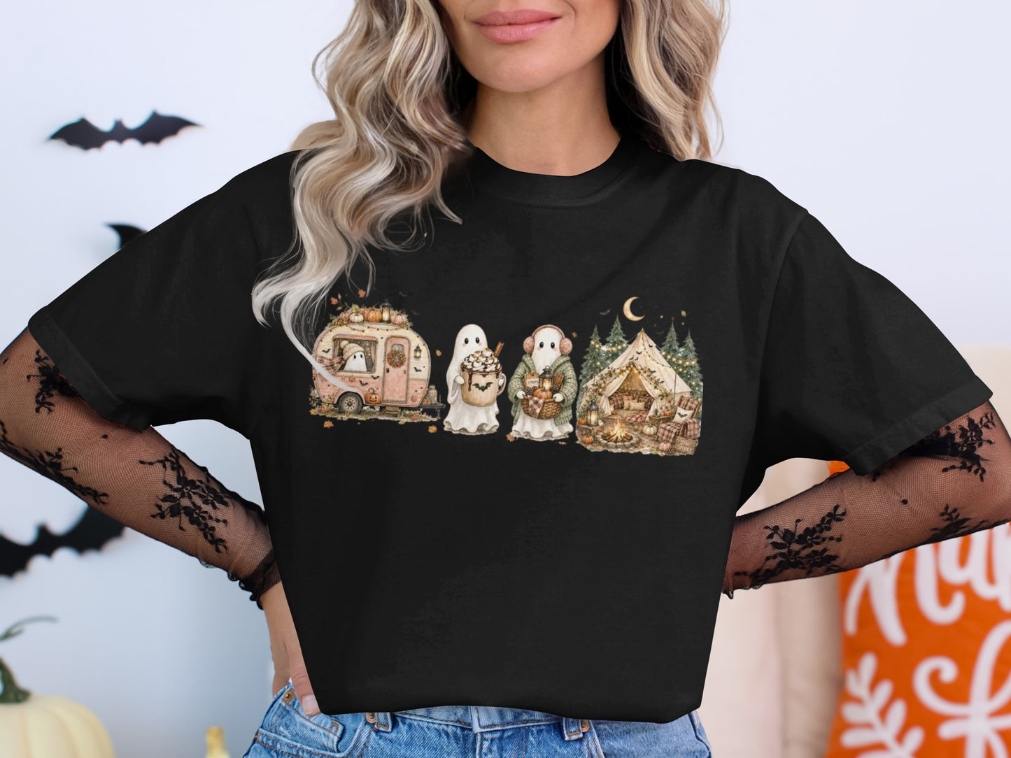 T-shirt graphic with ghosts camping and a vintage trailer.