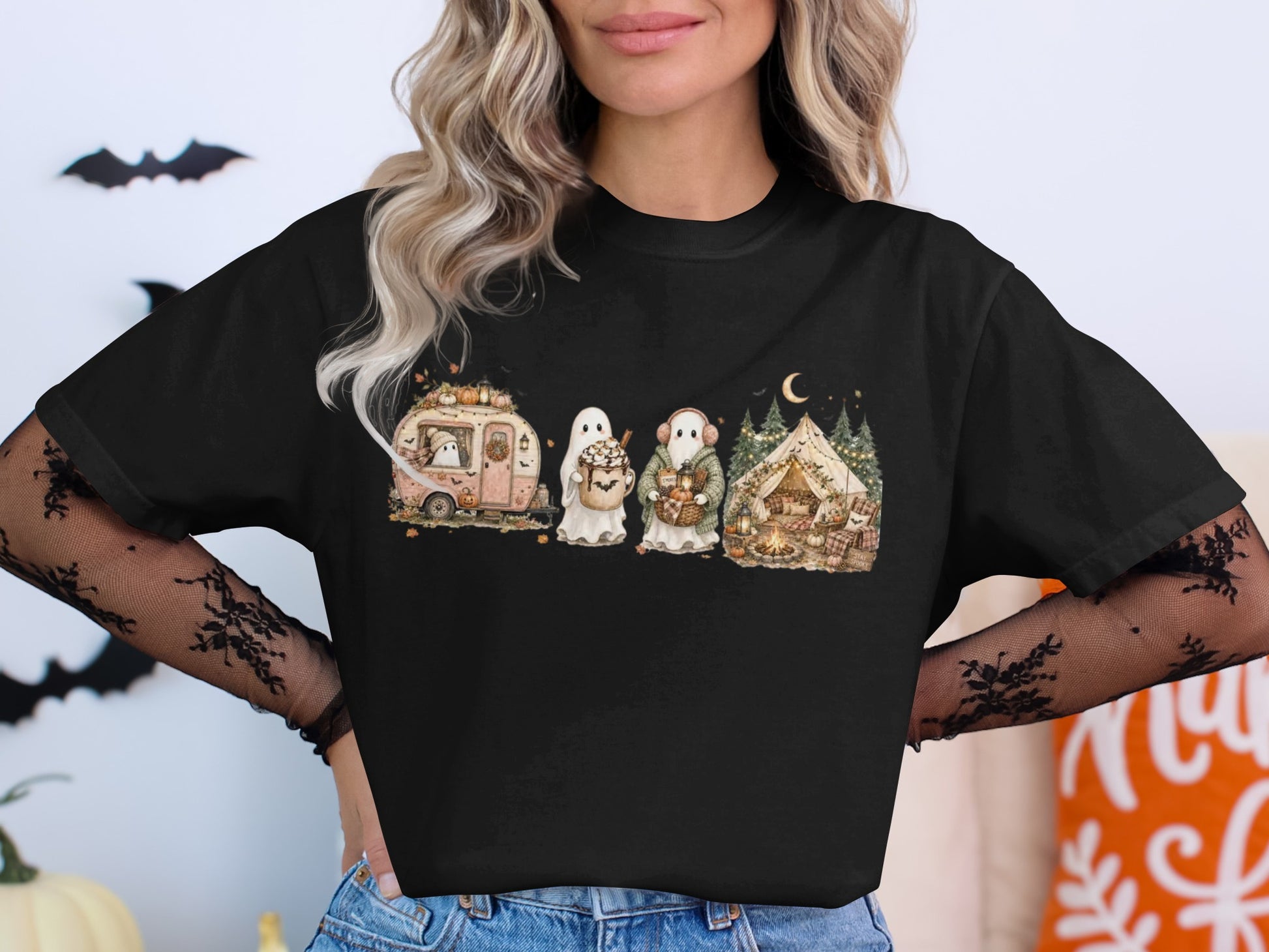 T-shirt graphic with ghosts camping and a vintage trailer.