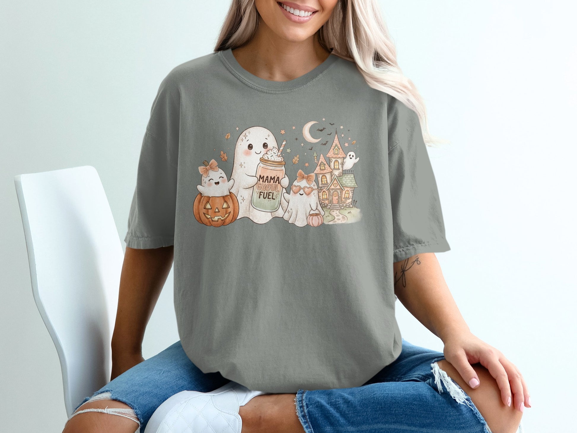 Halloween graphic with ghosts, pumpkin, and haunted house reads "Mama Ghoul Fuel".